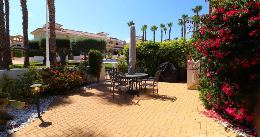 Townhouse with a private solarium and views in Doña Pepa, Costa Blanca
